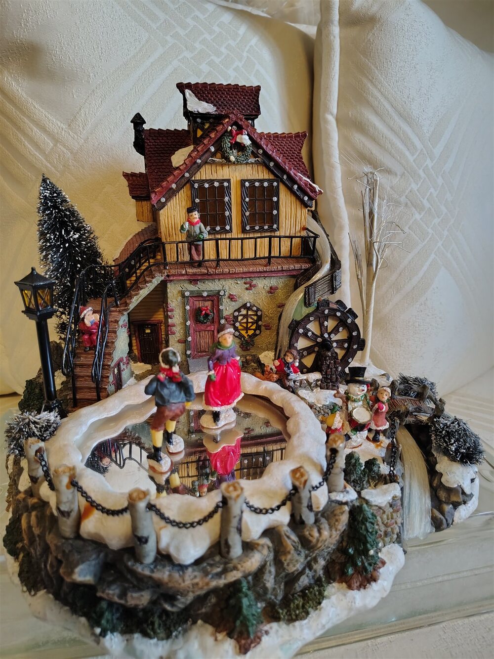 Lighted Animated Christmas Village with Skating Pond